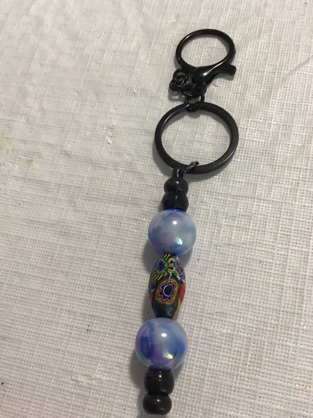 Black Keychain with Iridescent Blue Beads and Multicolor Millefiori Accent